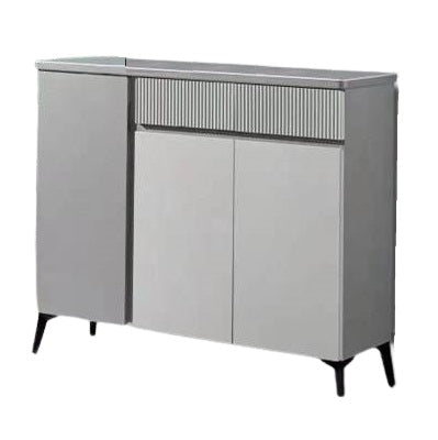 A wooden cabinet with three doors and two drawers, highlighting its elegant craftsmanship and functional storage.