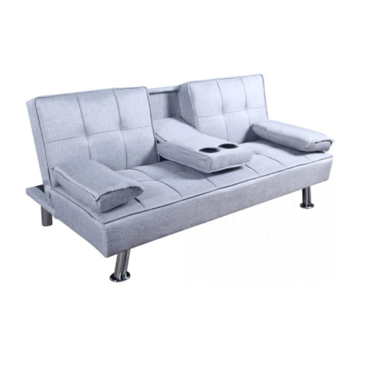 A stylish sofa bed equipped with a soft mattress and decorative pillows, ideal for both seating and sleeping.