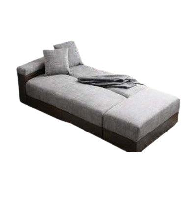 A modern sofa bed showcasing a supportive mattress and inviting pillows, designed for comfort and versatility in any space.