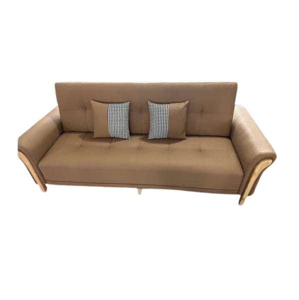 A modern sofa bed showcasing a supportive mattress and inviting pillows, designed for comfort and versatility in any space.