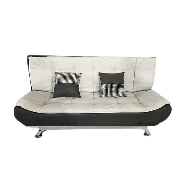 A sleek grey leather sofa featuring plush pillows, enhancing the elegance and comfort of the living space.