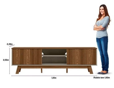Modern entertainment unit with wooden shelving and a stylish flat-screen TV prominently displayed.