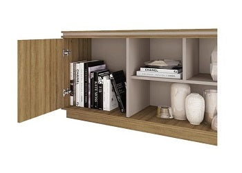 Modern entertainment unit with wooden shelving and a stylish flat-screen TV prominently displayed.