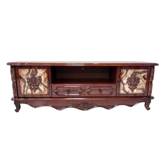 A wooden entertainment center with a television on top, serving as a focal point for home entertainment and decor.
